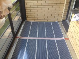 Mounting of the electric floor heating on the balcony