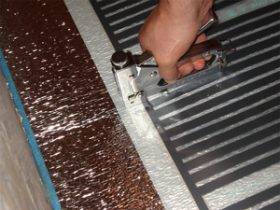 Монтаж інфрачервоного теплої підлоги