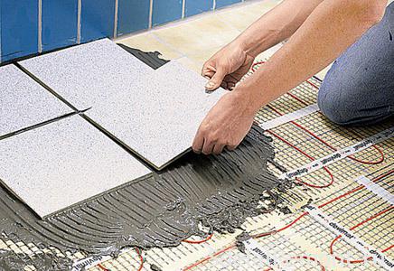 Laying tile floor heating