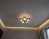 Creating a soaring ceiling of plasterboard with lighting tench