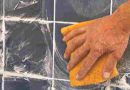 How to scrub the grout with a tile
