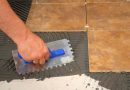 Laying floor tiles in the kitchen