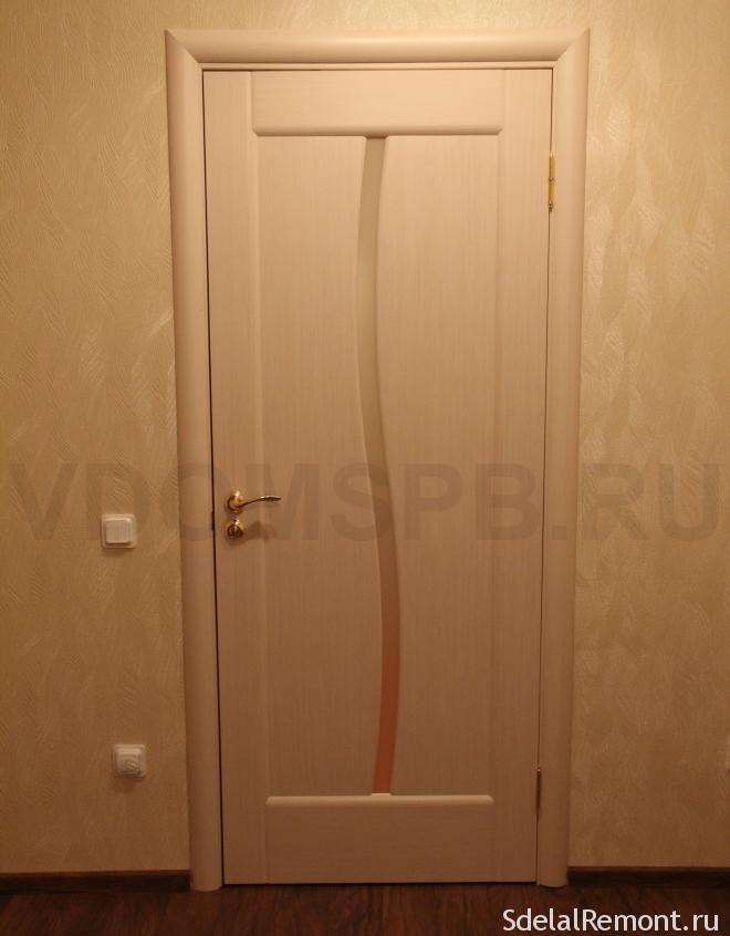 the door to the color of bleached oak 