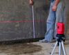 How to put a floor under the screed beacons using a laser level